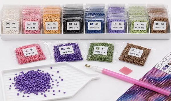 Numbered DMC-matched diamond drills in labelled bags